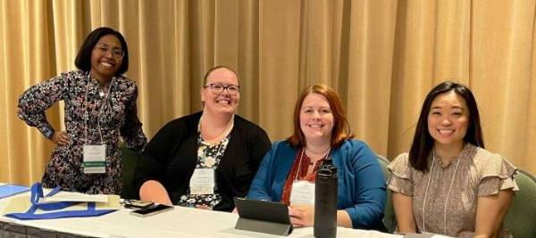 presenters sitting at a table